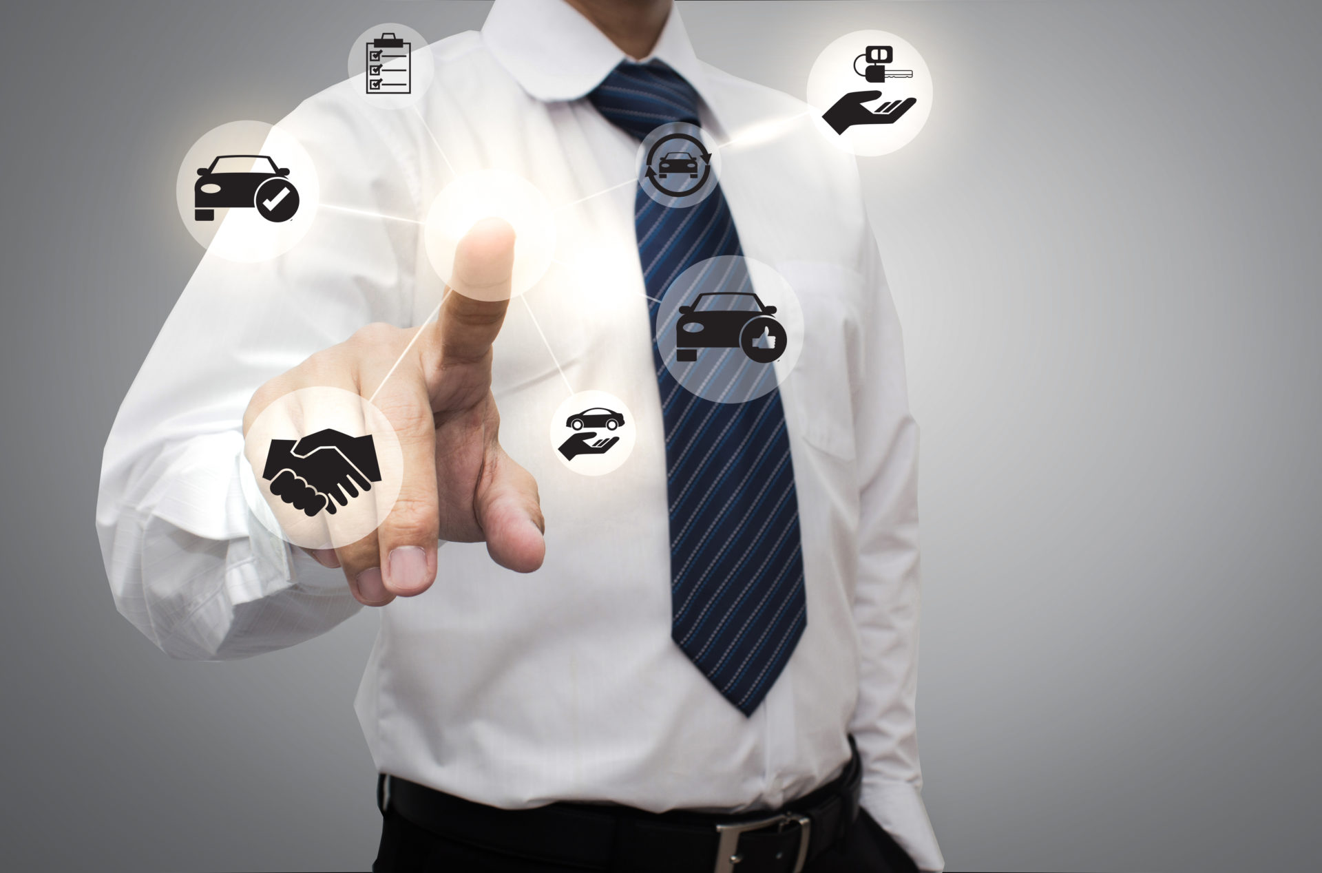 Businessman in White Shirt touching a screen