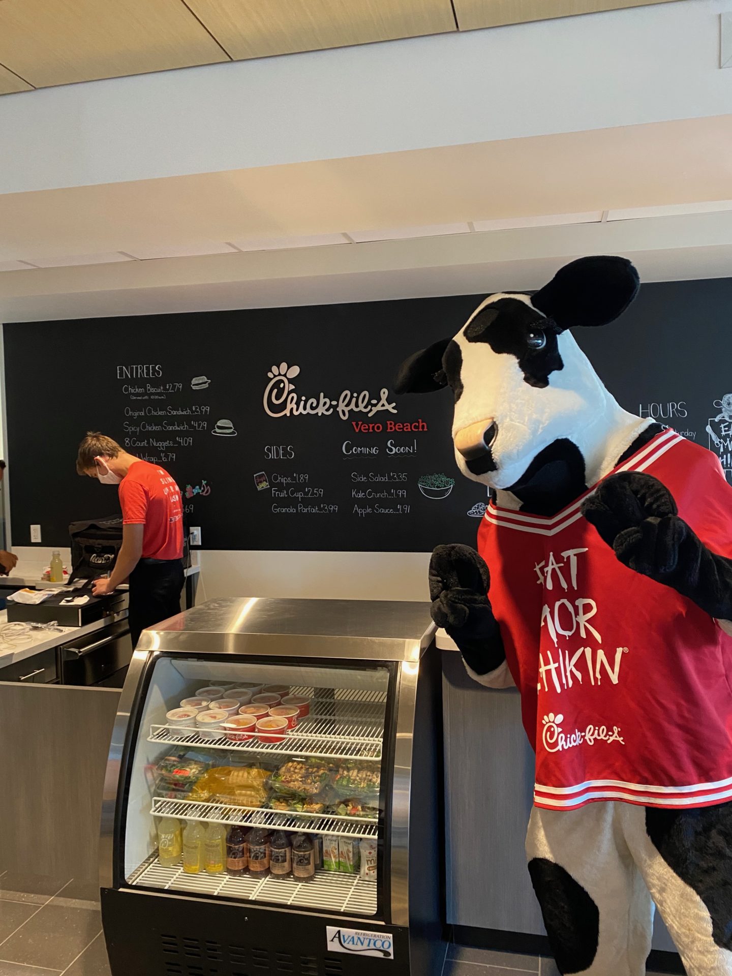 The chik-fil-a cow Inside the chik-fil-a cafe at Vero Beach Toyota. Global Custom Furnishings built the complete cafe area.