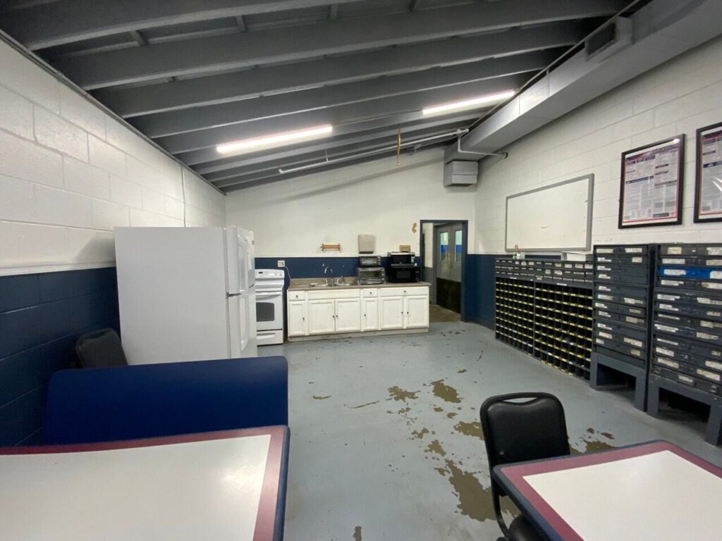 old technician breakroom with worn out furniture. Don’t Forget the Back of House Staff While Planning Your Next Facility Project