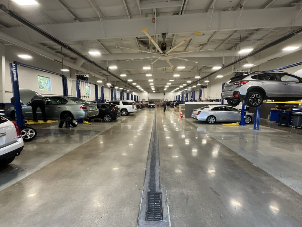 Polished and sealed dealership workshop floor. The four main flooring options for your service drive, workshop and detail bays