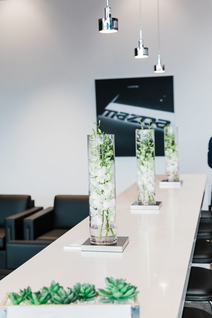 Floral displays to add colour to the dealership showroom for the grand opening.
